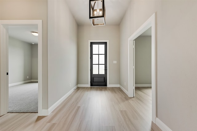 entrance foyer featuring light wood-type flooring