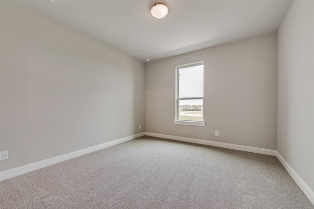 unfurnished room with carpet