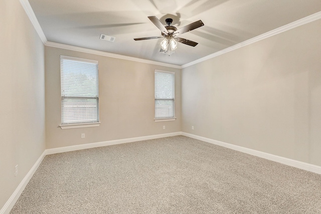 unfurnished room with carpet floors, ornamental molding, and ceiling fan