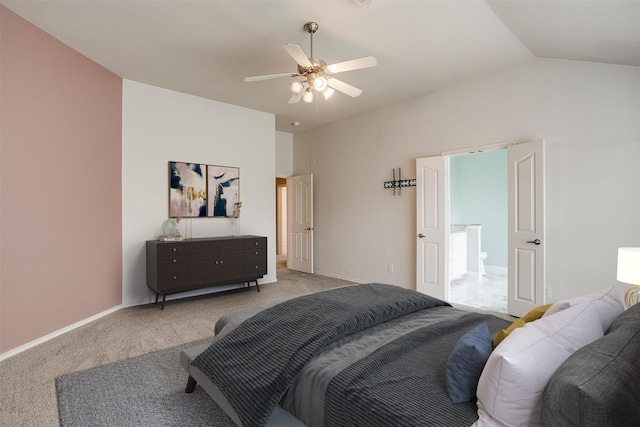 carpeted bedroom with vaulted ceiling and ceiling fan