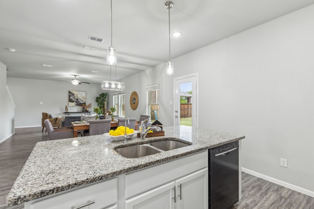 kitchen with ceiling fan, black dishwasher, sink, and white cabinetry