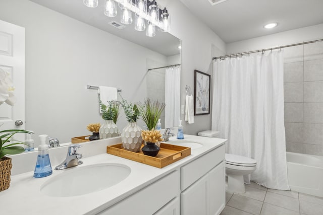 full bathroom with shower / tub combo with curtain, vanity, toilet, and tile patterned floors