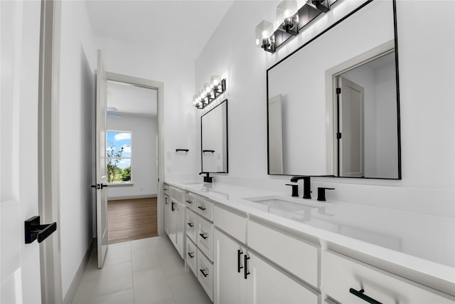 bathroom with vanity and tile patterned floors