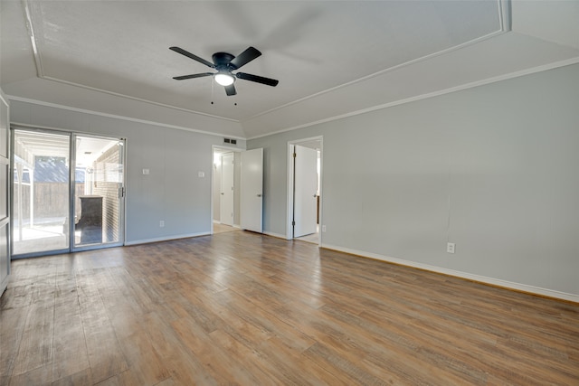 empty room featuring ceiling fan, light hardwood / wood-style flooring, and ornamental molding