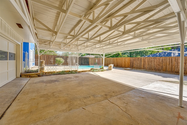 view of patio with a fenced in pool