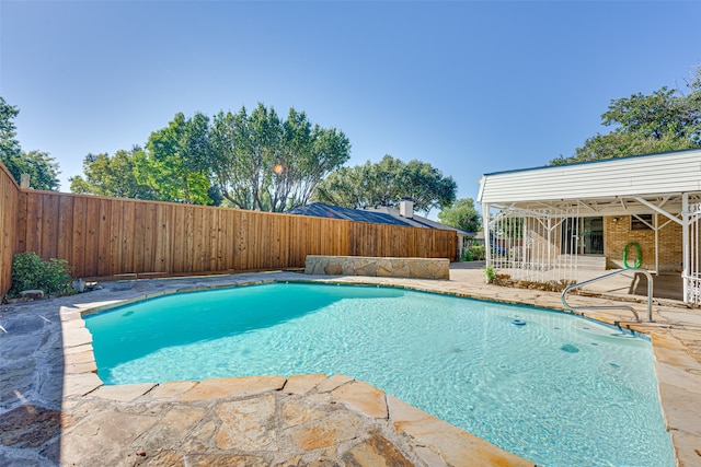 view of swimming pool featuring a patio