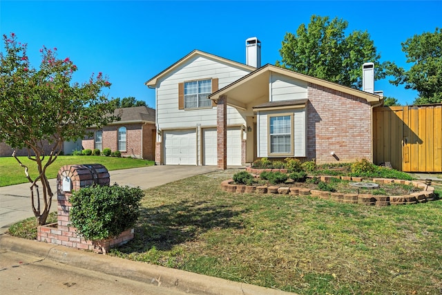 front facade featuring a garage and a front lawn