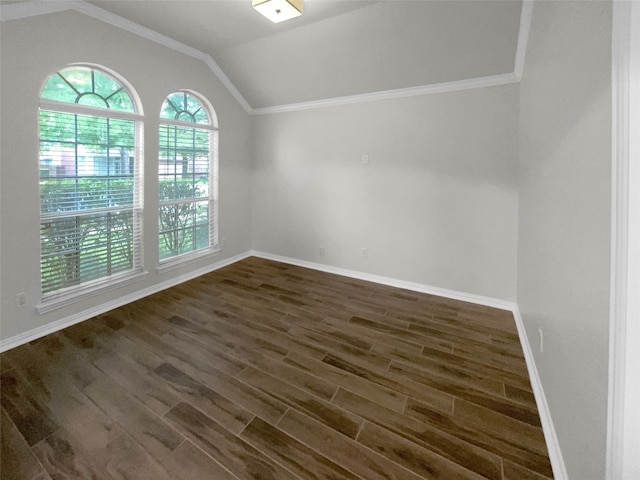 spare room featuring vaulted ceiling, crown molding, and dark hardwood / wood-style flooring