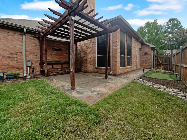 back of property featuring a pergola, a patio area, and a yard