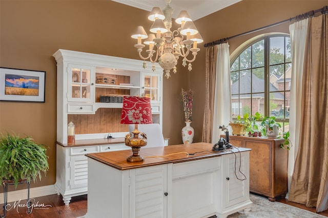 bar with white cabinets, decorative light fixtures, dark wood-type flooring, a notable chandelier, and butcher block countertops