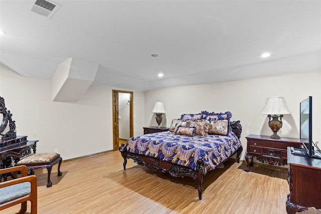 bedroom featuring light hardwood / wood-style flooring