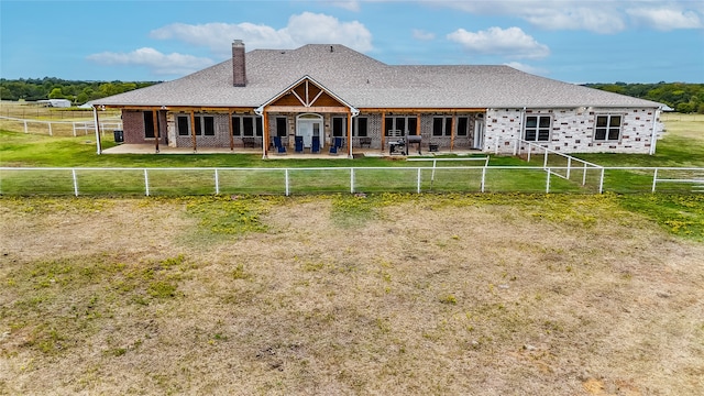 back of house featuring a patio area