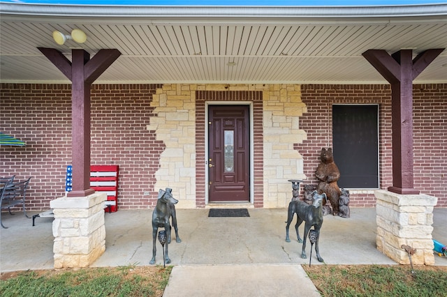 property entrance with a porch