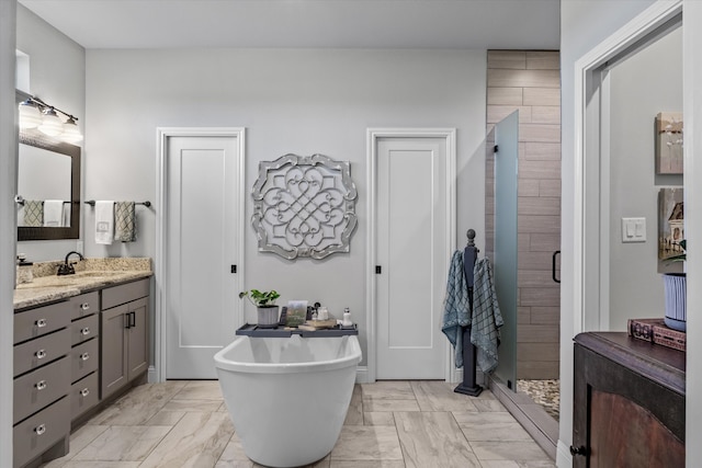 bathroom with plus walk in shower and vanity