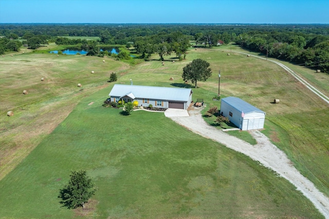 bird's eye view featuring a water view and a rural view