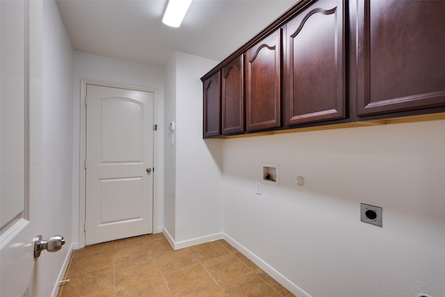 washroom with cabinets, washer hookup, hookup for a gas dryer, and electric dryer hookup