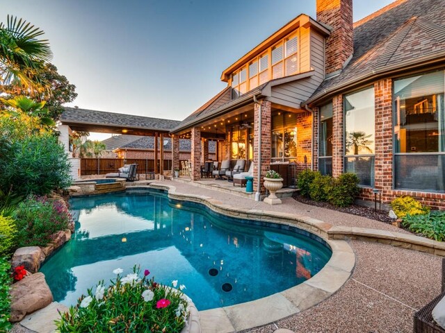 view of pool featuring a patio