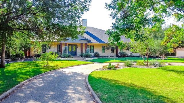 exterior space with a lawn