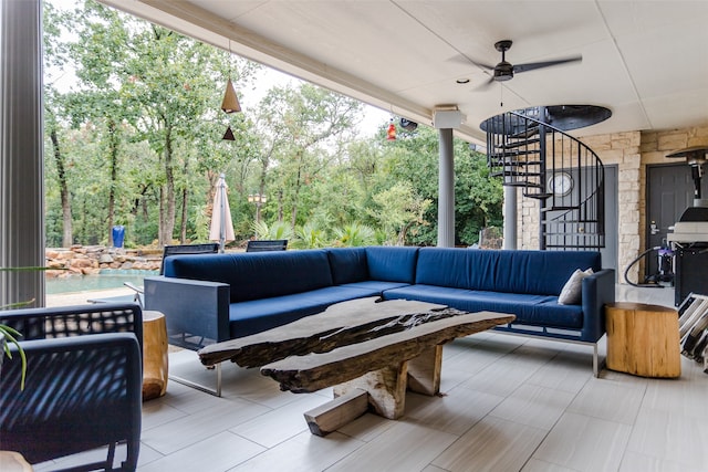 view of patio / terrace with ceiling fan and an outdoor hangout area