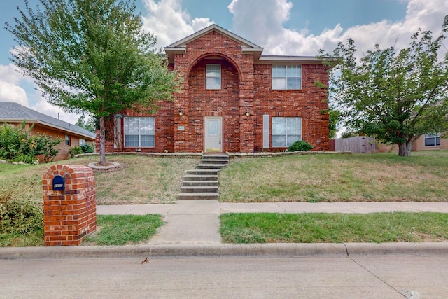 view of front facade with a front lawn