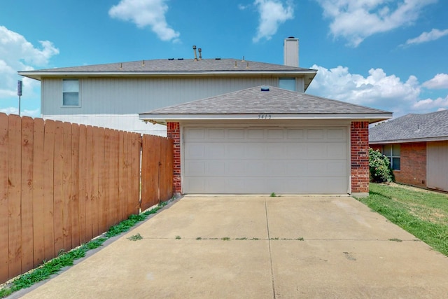 view of front of home with a garage