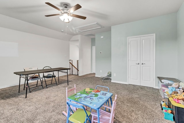 playroom featuring ceiling fan and carpet floors