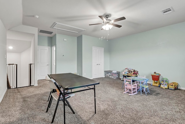 playroom with carpet and ceiling fan