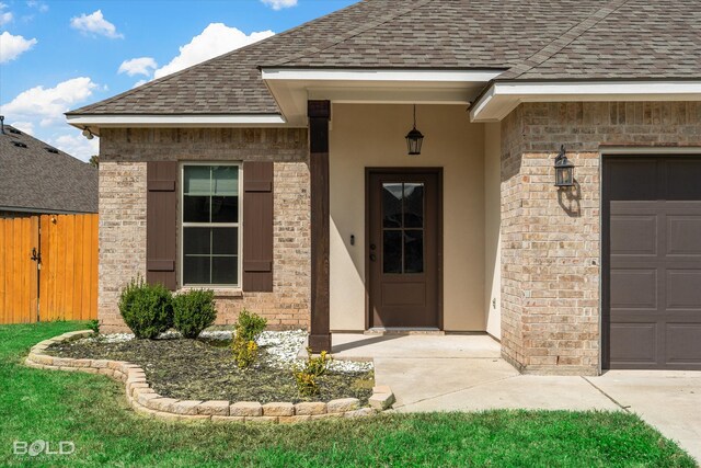 entrance to property with a garage