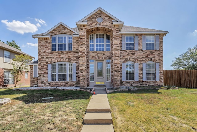 view of front of home with a front yard