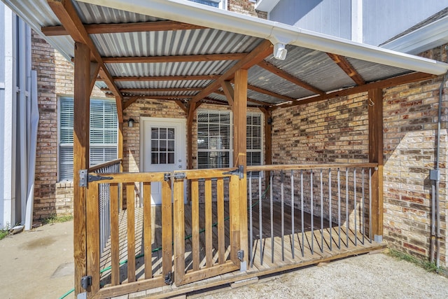 view of patio / terrace featuring a carport