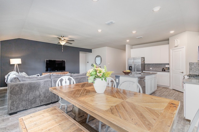 641 Fletcher Dr, Fate, TX 75087 - dining area with light wood-style flooring, visible vents, recessed lighting, lofted ceiling, and ceiling fan