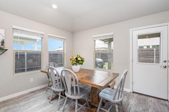 641 Fletcher Dr, Fate, TX 75087 - dining space featuring light wood finished floors, baseboards, and lofted ceiling