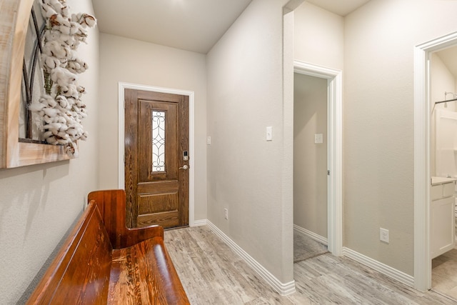 641 Fletcher Dr, Fate, TX 75087 - foyer with light wood-type flooring and baseboards