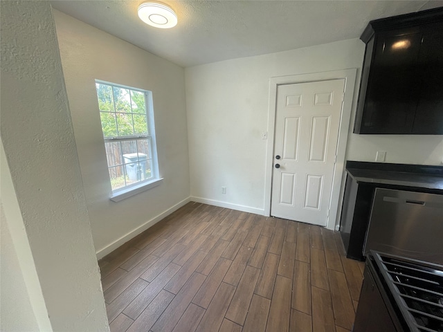 unfurnished dining area with wood-type flooring