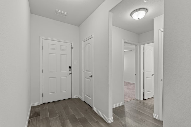 hall featuring hardwood / wood-style flooring