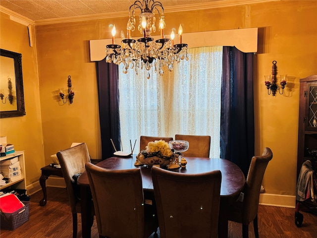 dining room featuring a chandelier, dark wood-type flooring, and crown molding