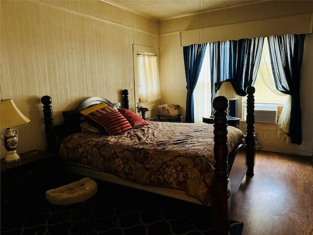 bedroom featuring wood-type flooring