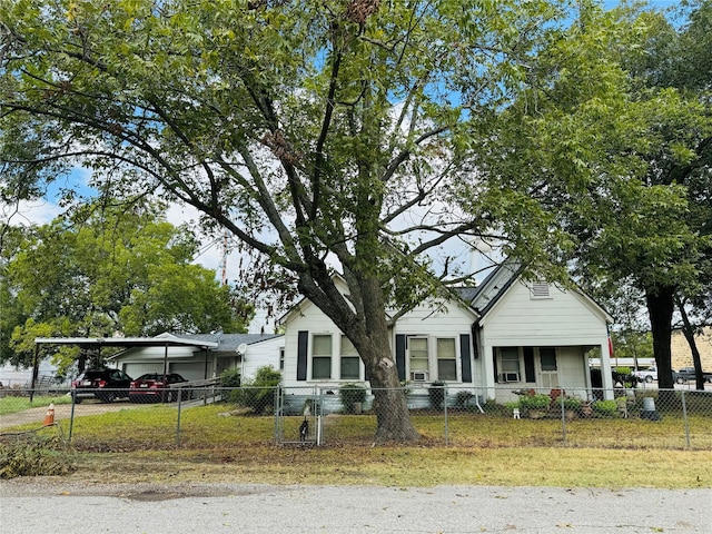 view of front of property with a carport