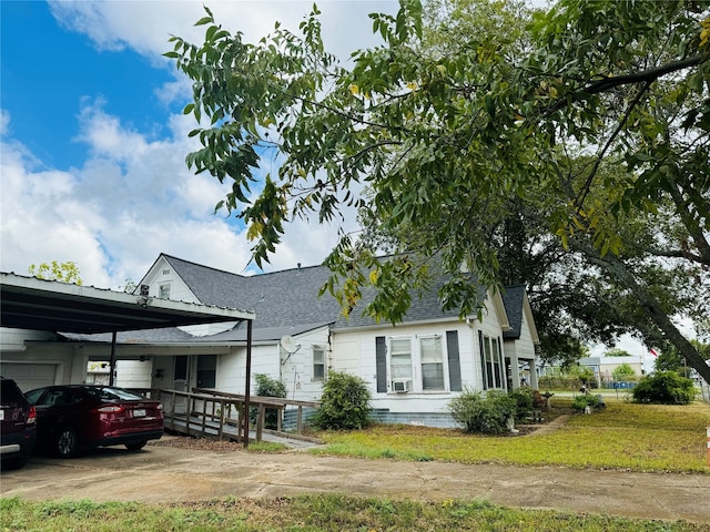 view of home's exterior featuring a carport