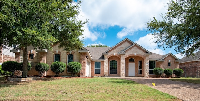 view of front of house with a front lawn