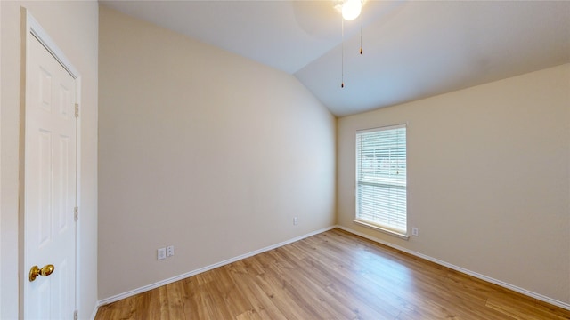 unfurnished room with ceiling fan, lofted ceiling, and light hardwood / wood-style floors