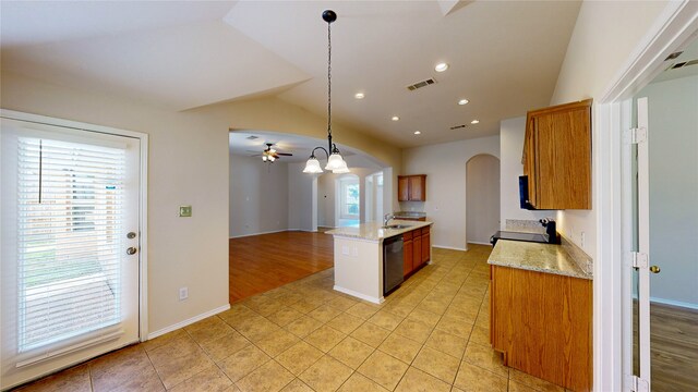 kitchen with dishwasher, sink, lofted ceiling, hanging light fixtures, and black range oven