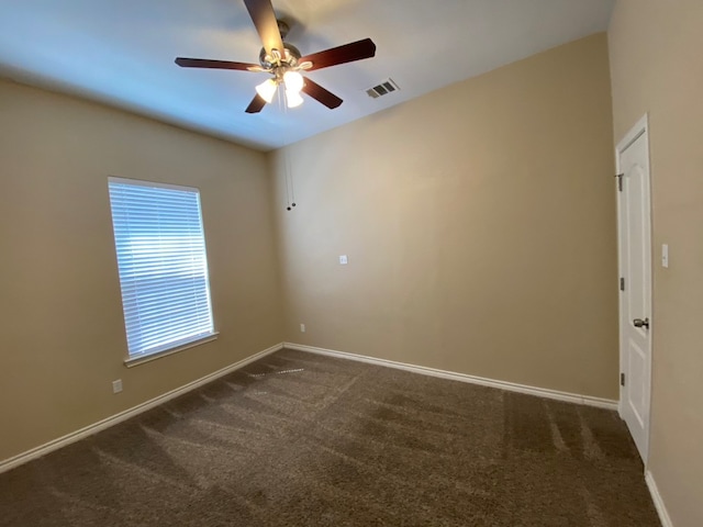 carpeted empty room with ceiling fan