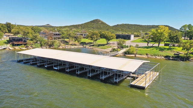 dock area featuring a water and mountain view