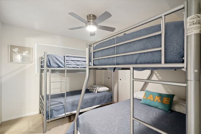 bedroom featuring ceiling fan and carpet flooring