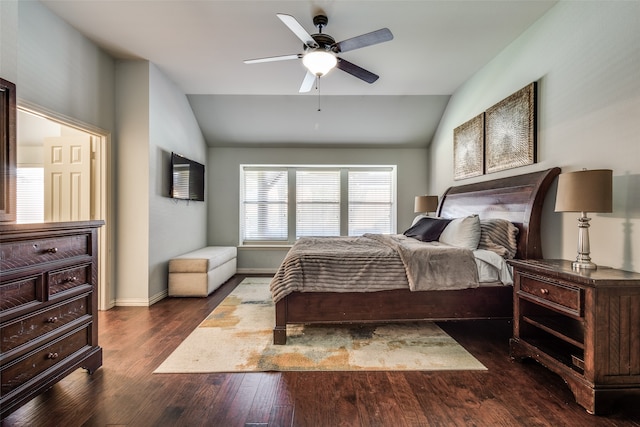 bedroom featuring lofted ceiling, dark hardwood / wood-style floors, and ceiling fan