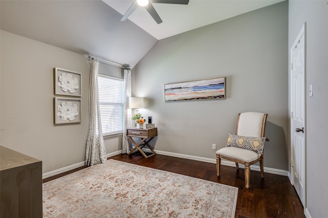 sitting room featuring dark wood-type flooring, ceiling fan, and vaulted ceiling