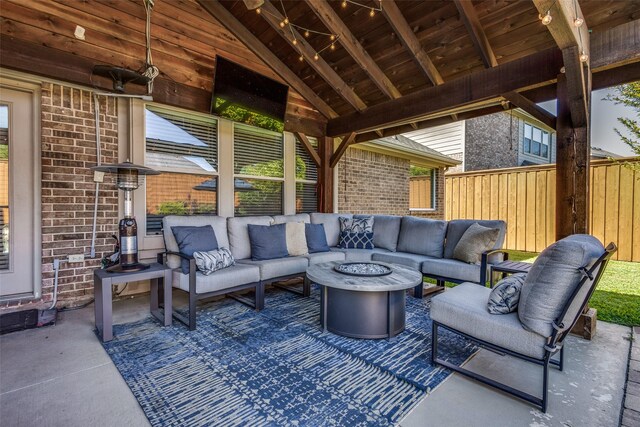 view of patio / terrace featuring area for grilling, an outdoor living space with a fire pit, a gazebo, ceiling fan, and a grill