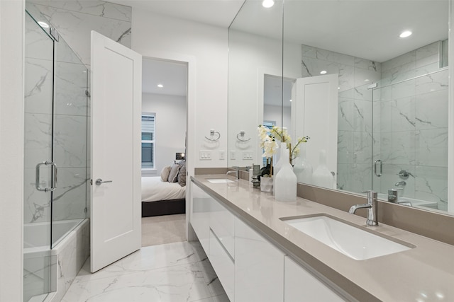 bathroom featuring shower with separate bathtub and vanity