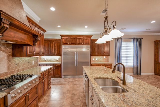 kitchen featuring sink, custom exhaust hood, appliances with stainless steel finishes, crown molding, and light stone countertops